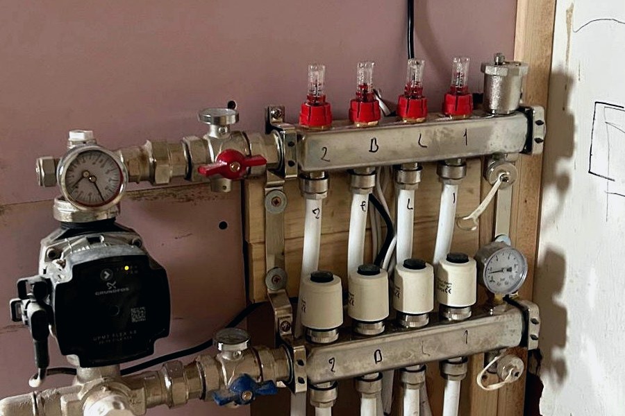 Boiler, manifold and heating controls on site